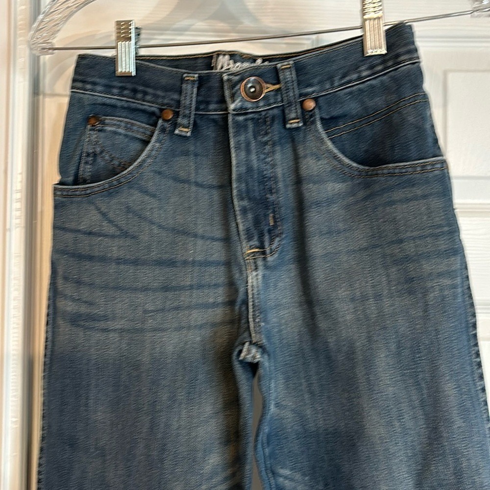 14 Slim Wrangler Retro relaxed cut